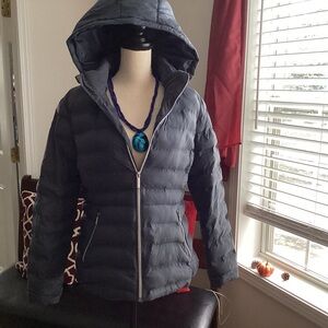 medium dark blue puffer jacket
